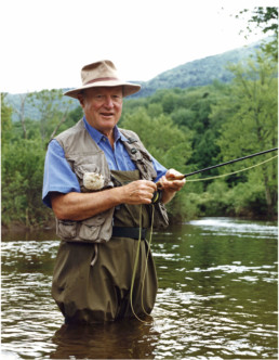 Leigh Perkins standing in the Battenkill.