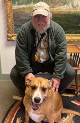 Bob Goodfellow poses with his dog Emme.