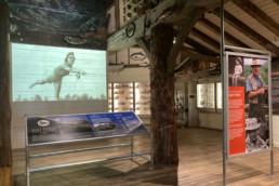 The entryway to the new AMFF gallery at the Wonders of Wildlife, including a welcome panel and a tribute to Leigh Perkins.