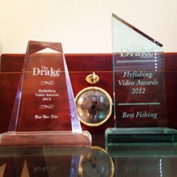 Two clear glass fly fishing video awards from The Drake magazine: best new film, 2013, and best fishing, 2012.