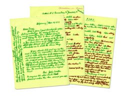Handwritten pages from John Voelker. They're written in green marker on lined yellow paper, with edits added in red marker.