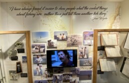 Part of the exhibition honoring Jose Wejebe. Visible are photos, reels, journals, a tribute video, and a quote from Wejebe: 