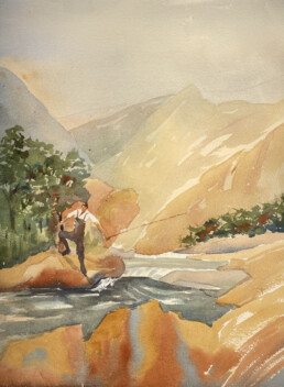 Warm yellows and golds dominate a watercolor of a white angler standing on a riverbank. He holds his rod in his left hand with the rod outstretched over the water as he steps down the bank. He wears waders over a white shirt.
